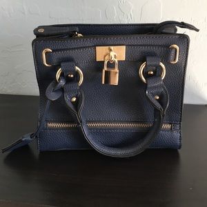 Mini navy bag with gold locks and more!! Authentic
